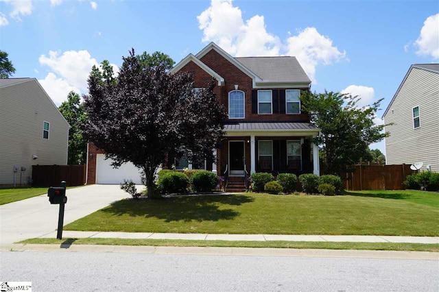 view of front facade with a front lawn, a porch, and a garage