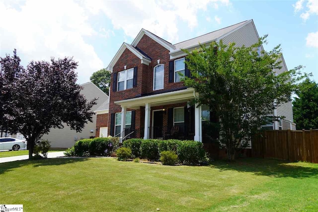 view of front of home with a front lawn