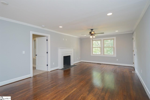 unfurnished living room featuring ceiling fan, crown molding, and dark hardwood / wood-style floors