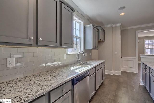 kitchen featuring light stone counters, tasteful backsplash, stainless steel dishwasher, dark hardwood / wood-style floors, and gray cabinets