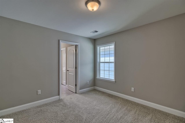 view of carpeted spare room