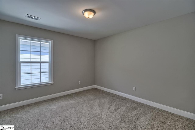 view of carpeted spare room