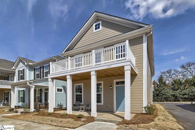 greek revival house with covered porch