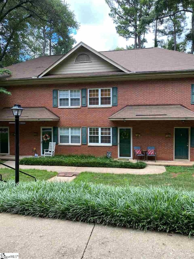 view of front of home with a front yard