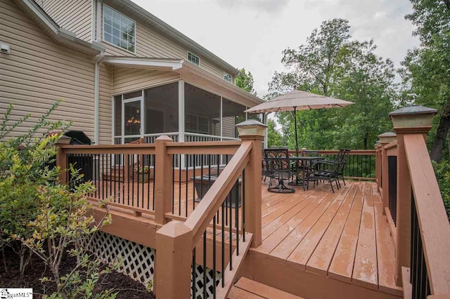 wooden terrace with a sunroom