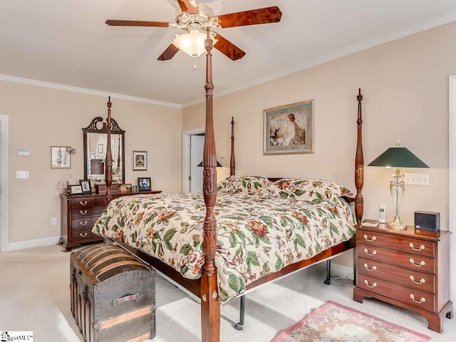 carpeted bedroom with crown molding and ceiling fan