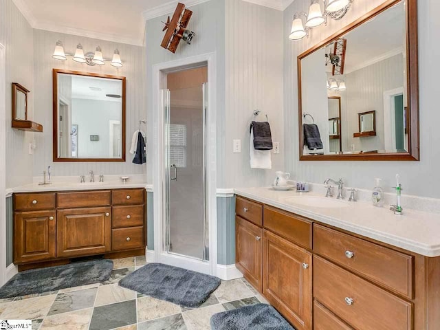 bathroom featuring an enclosed shower, tile floors, dual sinks, and vanity with extensive cabinet space