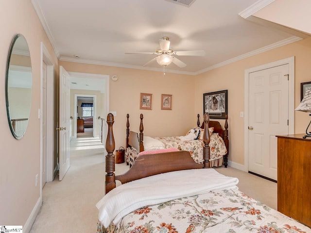 bedroom featuring ceiling fan, ornamental molding, and light carpet