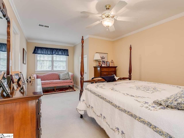 bedroom with ornamental molding, light colored carpet, and ceiling fan