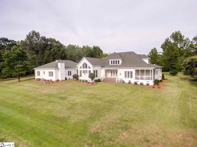 view of front of home featuring a front lawn