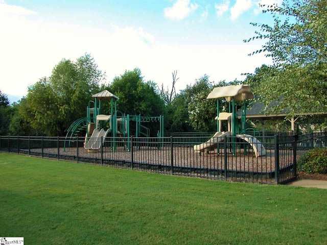 view of playground with a yard