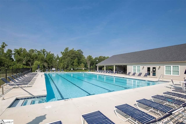 view of swimming pool featuring a patio