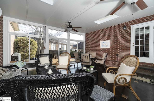 sunroom / solarium with ceiling fan