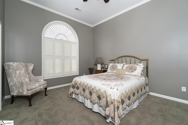 bedroom featuring crown molding, ceiling fan, and dark colored carpet