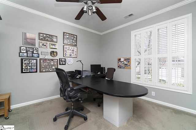 carpeted office featuring ceiling fan and ornamental molding