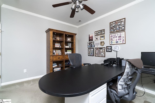 home office with ceiling fan, crown molding, and carpet floors