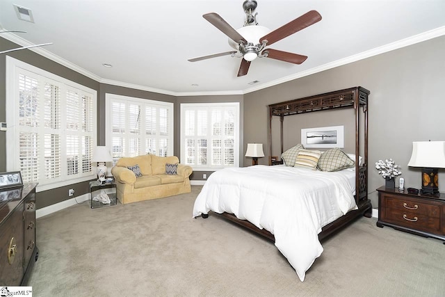 bedroom featuring light carpet, crown molding, and ceiling fan