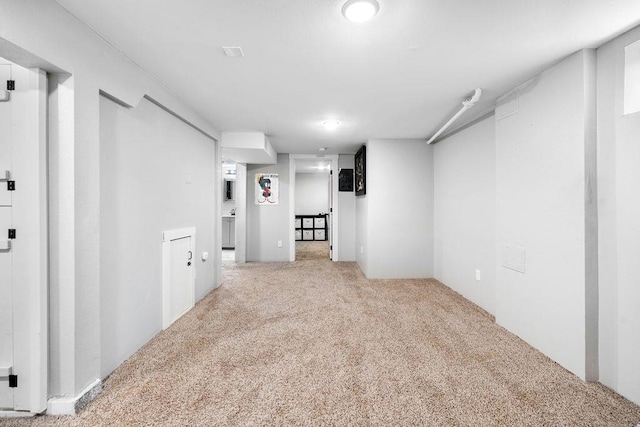 basement with light carpet