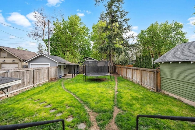 view of yard featuring a trampoline