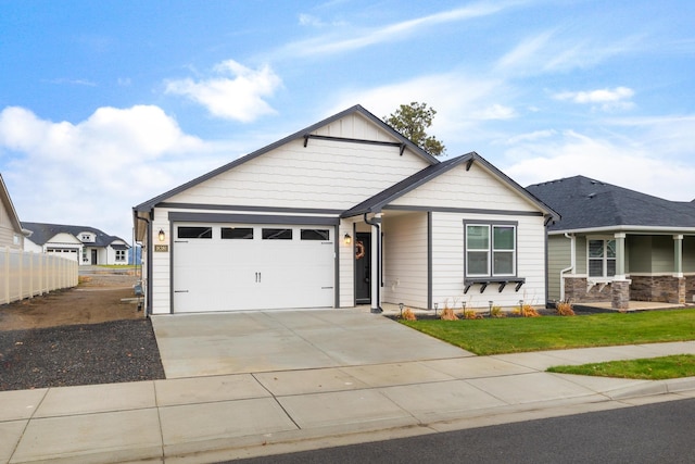 craftsman house with a garage