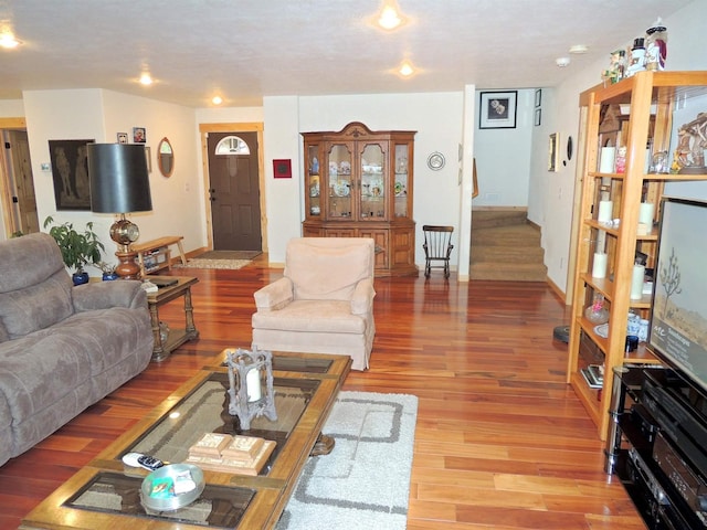 35025 Mourning Dove Ln N, Davenport, WA 99122 - living room with wood finished floors, baseboards, and recessed lighting