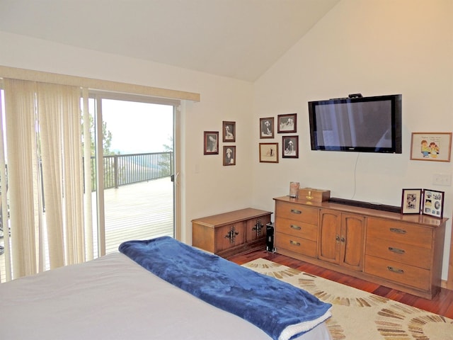 bedroom featuring high vaulted ceiling, carpet flooring, and a closet