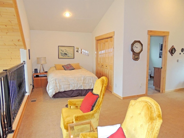 35025 Mourning Dove Ln N, Davenport, WA 99122 - bedroom with carpet floors, vaulted ceiling, baseboards, and a closet