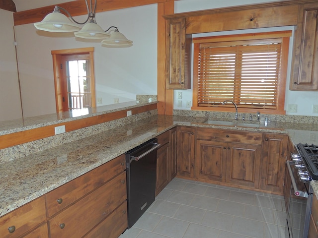 kitchen featuring decorative light fixtures, gas range oven, light stone counters, stainless steel dishwasher, and light tile floors