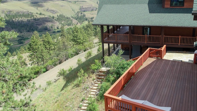 view of yard featuring a wooden deck