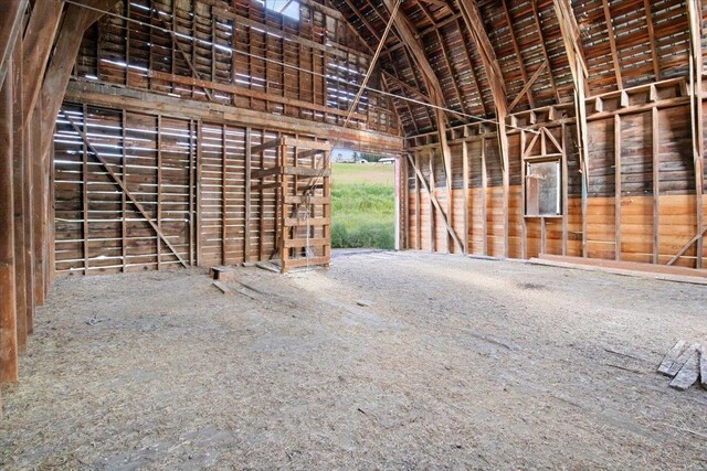 misc room with high vaulted ceiling