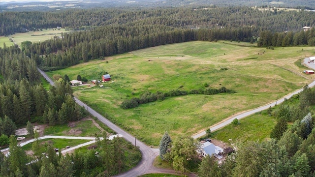 birds eye view of property featuring a rural view