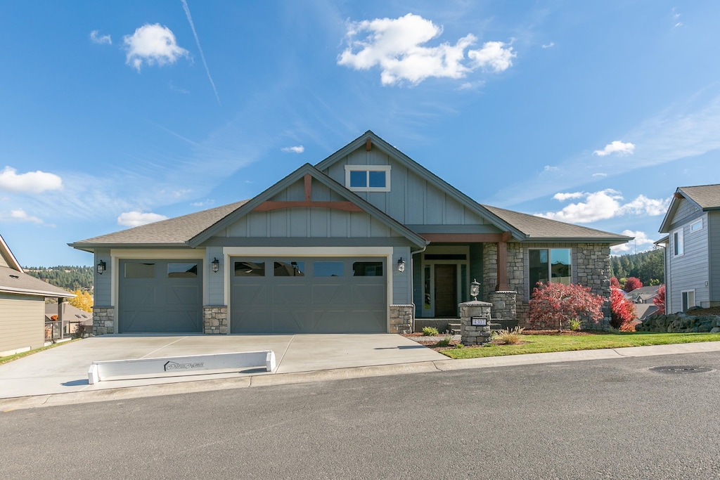 craftsman inspired home featuring a garage