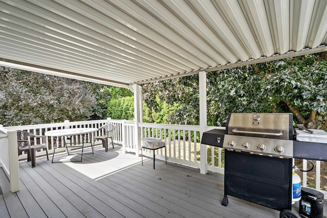 wooden deck featuring area for grilling