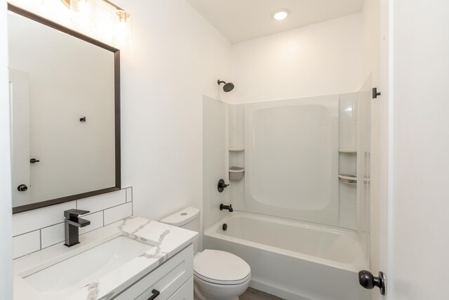 1814 E Carol St, Deer Park, WA 99006 - bathroom with toilet, vanity, and bathing tub / shower combination