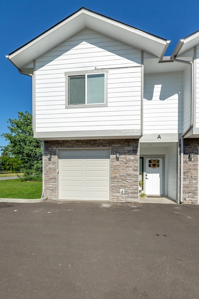 view of front of house with a garage