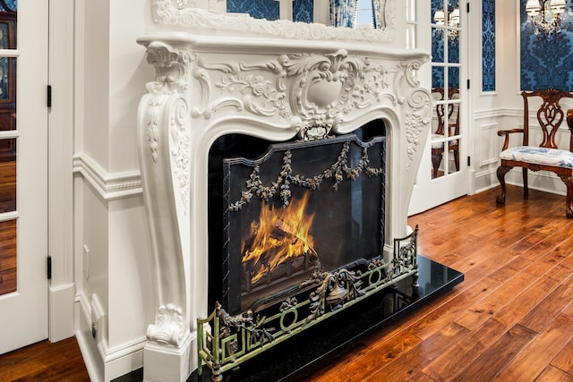 interior details featuring hardwood / wood-style flooring