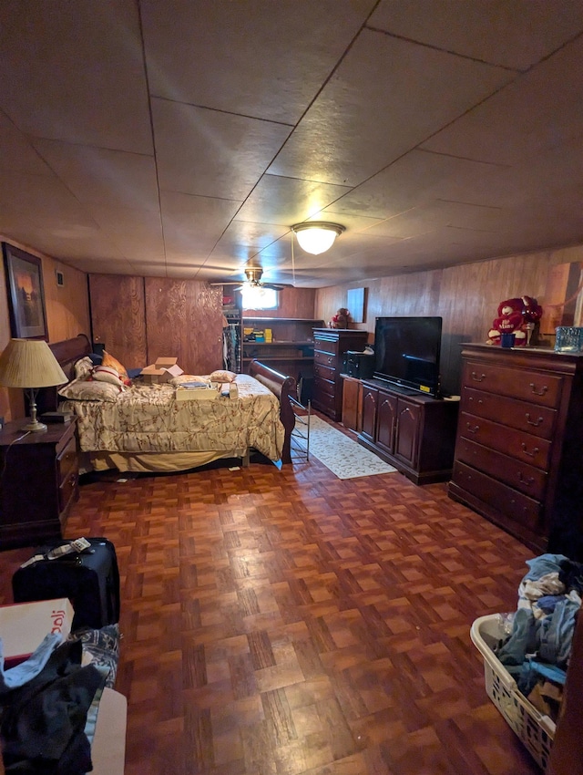 bedroom with wooden walls