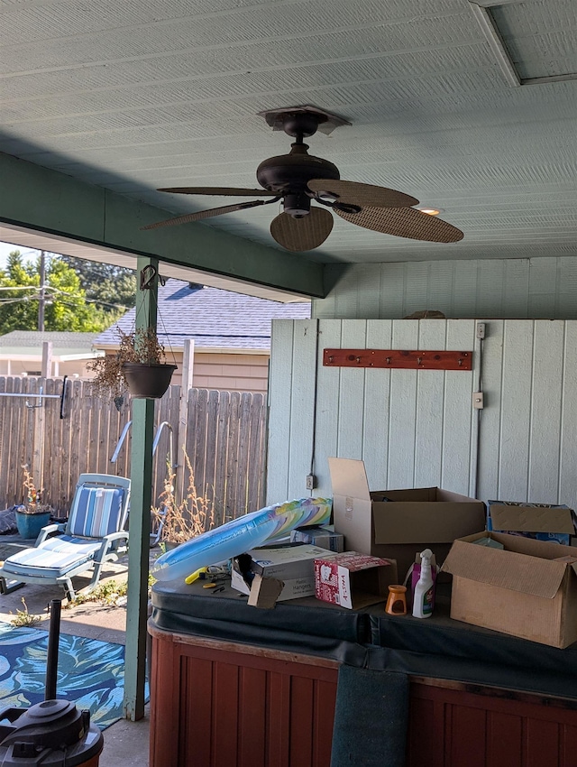 exterior space featuring fence and ceiling fan