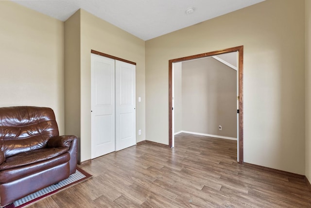 sitting room with light hardwood / wood-style floors