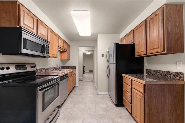 kitchen featuring stainless steel appliances and sink