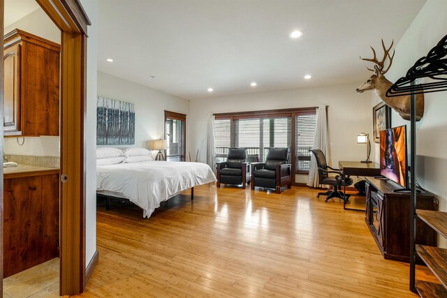 bedroom featuring light hardwood / wood-style flooring