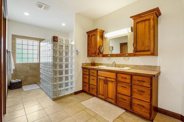 bathroom with vanity and tile patterned floors