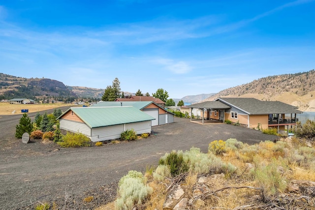 exterior space featuring a mountain view