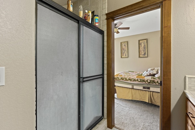 bathroom featuring vanity and ceiling fan