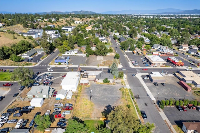 drone / aerial view featuring a mountain view