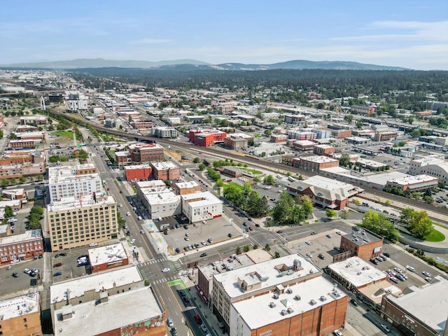 drone / aerial view featuring a mountain view