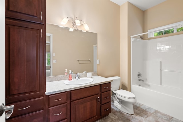 full bath featuring shower / bath combination, vanity, and toilet