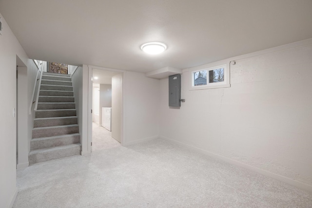 basement with electric panel and independent washer and dryer