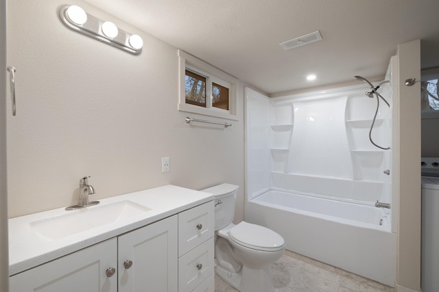 full bathroom featuring a textured ceiling, vanity, shower / bathtub combination, and toilet