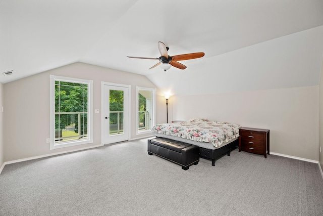 carpeted bedroom with ceiling fan, access to outside, and vaulted ceiling